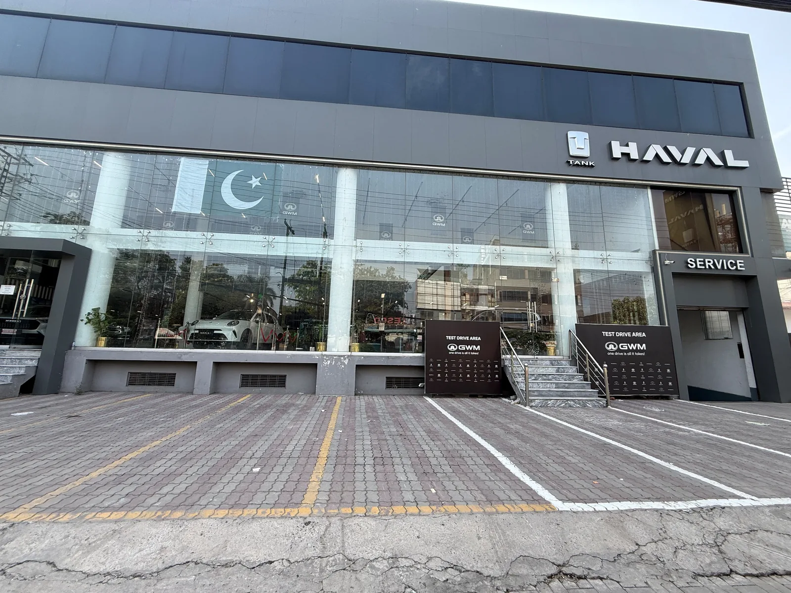Queens Motors dealership exterior